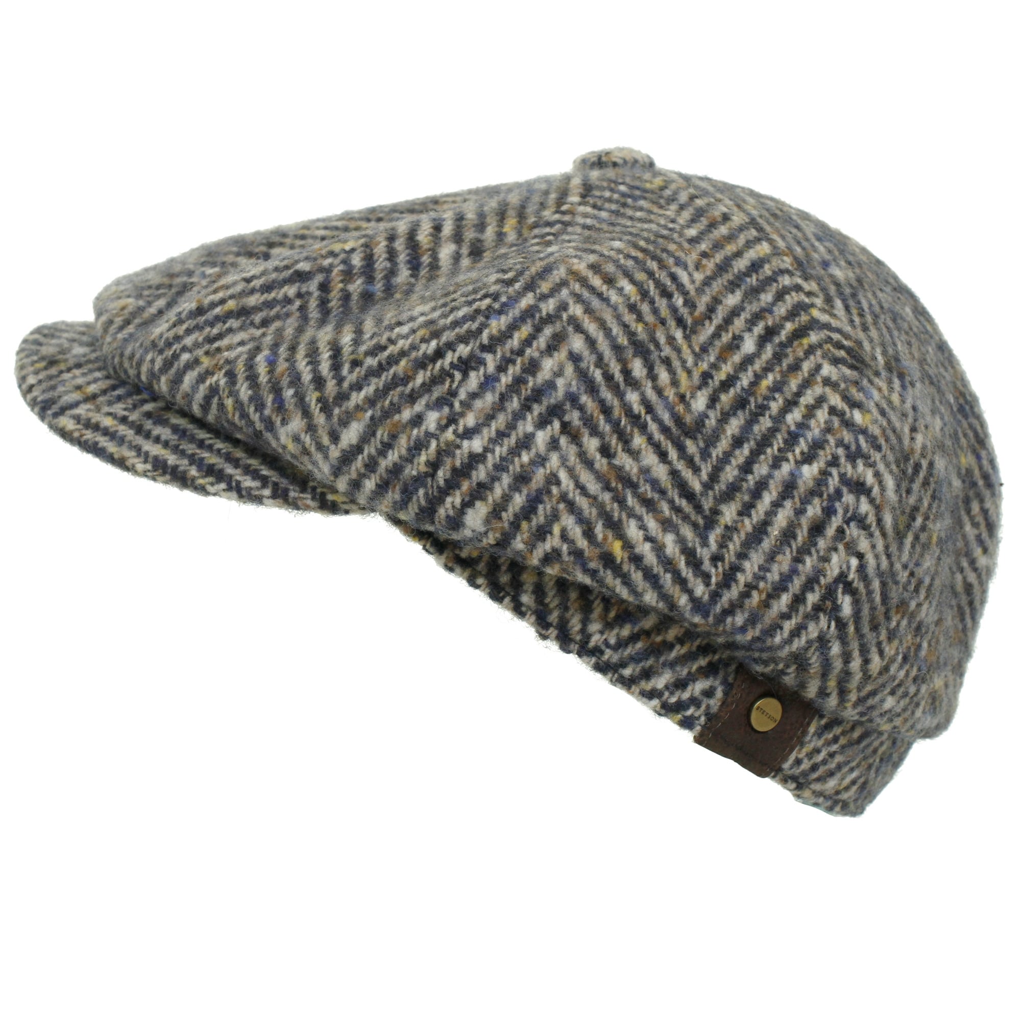 A stylish grey and brown herringbone tweed flat cap, seen from a side angle.