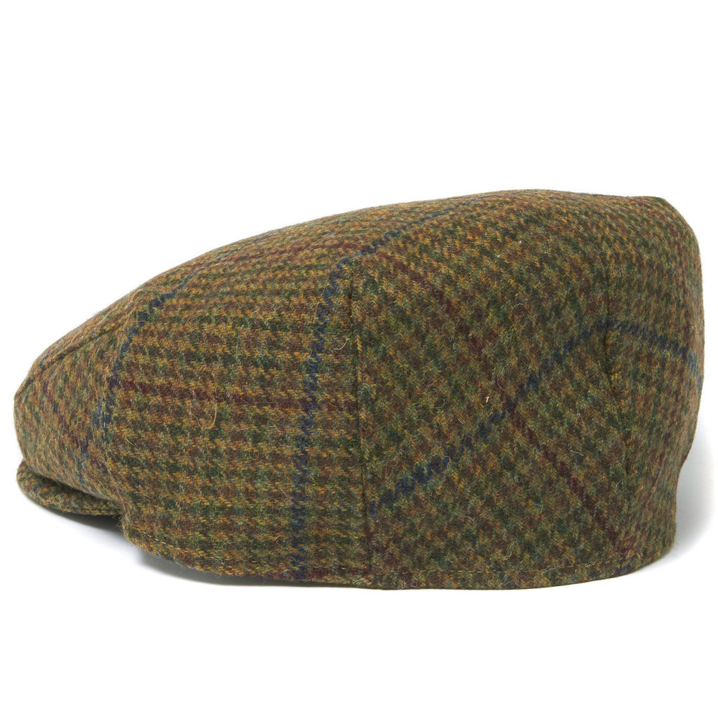 Side profile of a classic olive checked flat cap on a white background.