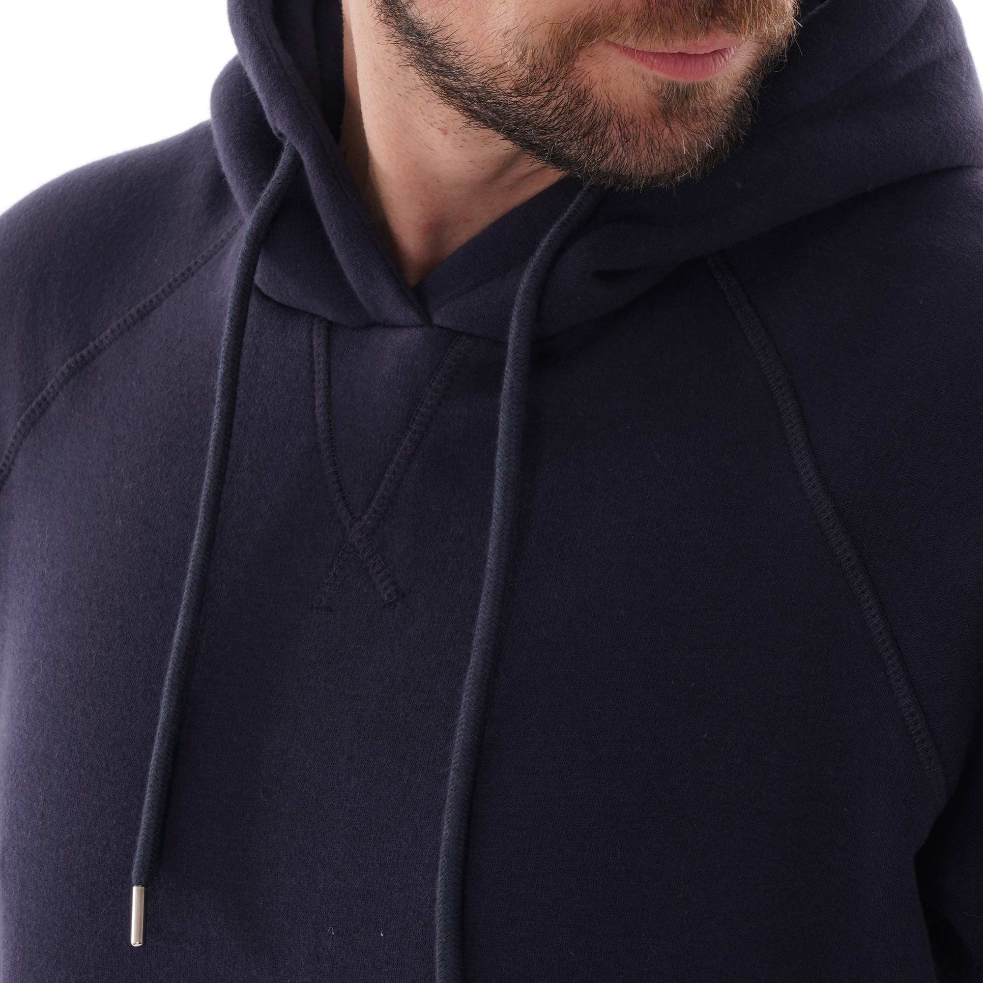 Close-up of the C17 Jeans raglan sleeve hoodie in navy.
