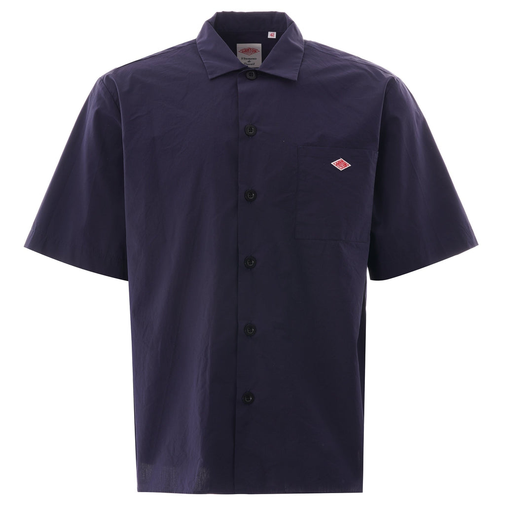 Navy blue short-sleeved shirt with a small red diamond logo on the left chest. This is a front view.