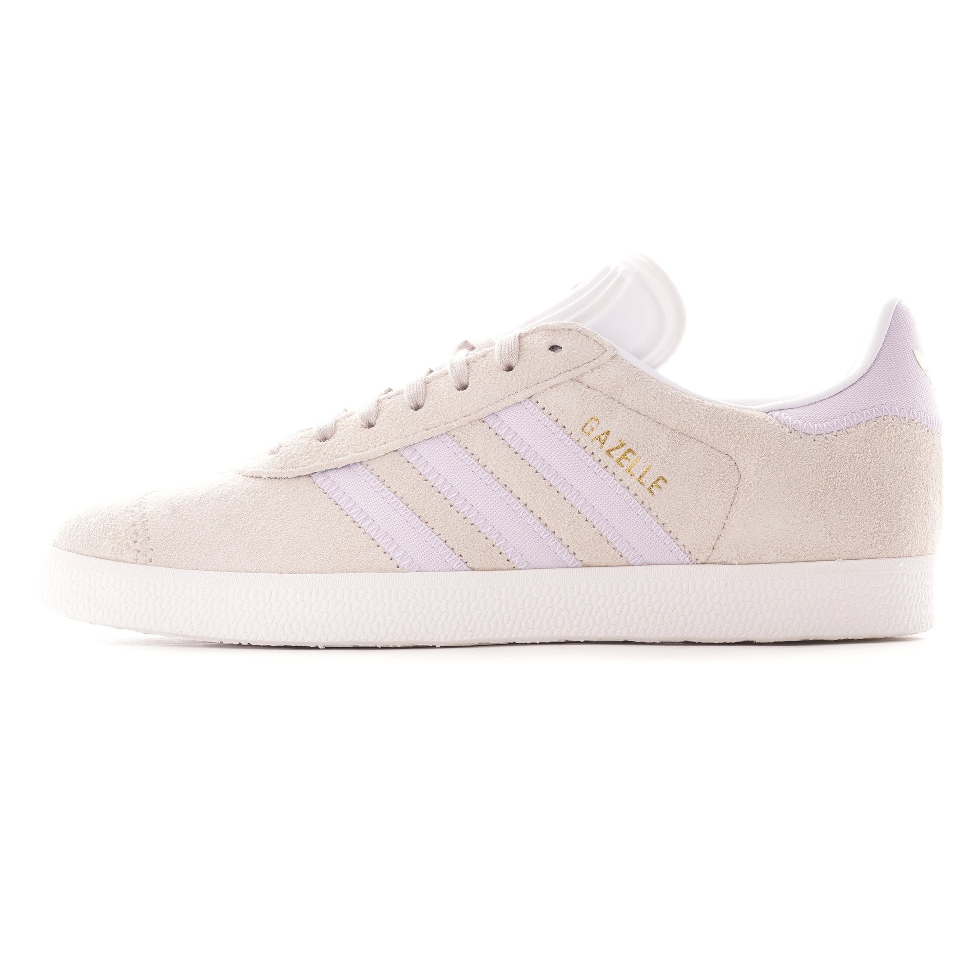 A pale beige Adidas Gazelle trainer with three light purple stripes on the side.