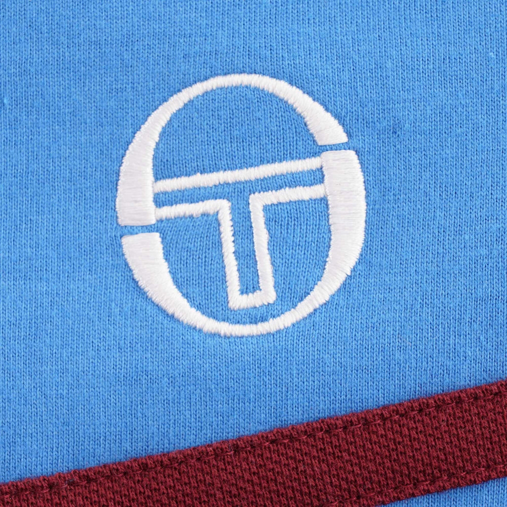 Detail of the embroidered Sergio Tacchini logo on the Young Line T-Shirt.
