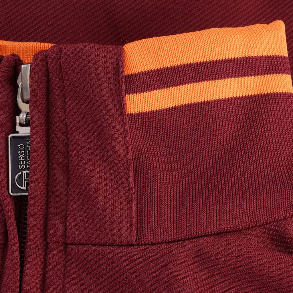 A close-up of the collar of the Sergio Tacchini Orion Track Top, showing the orange stripes.