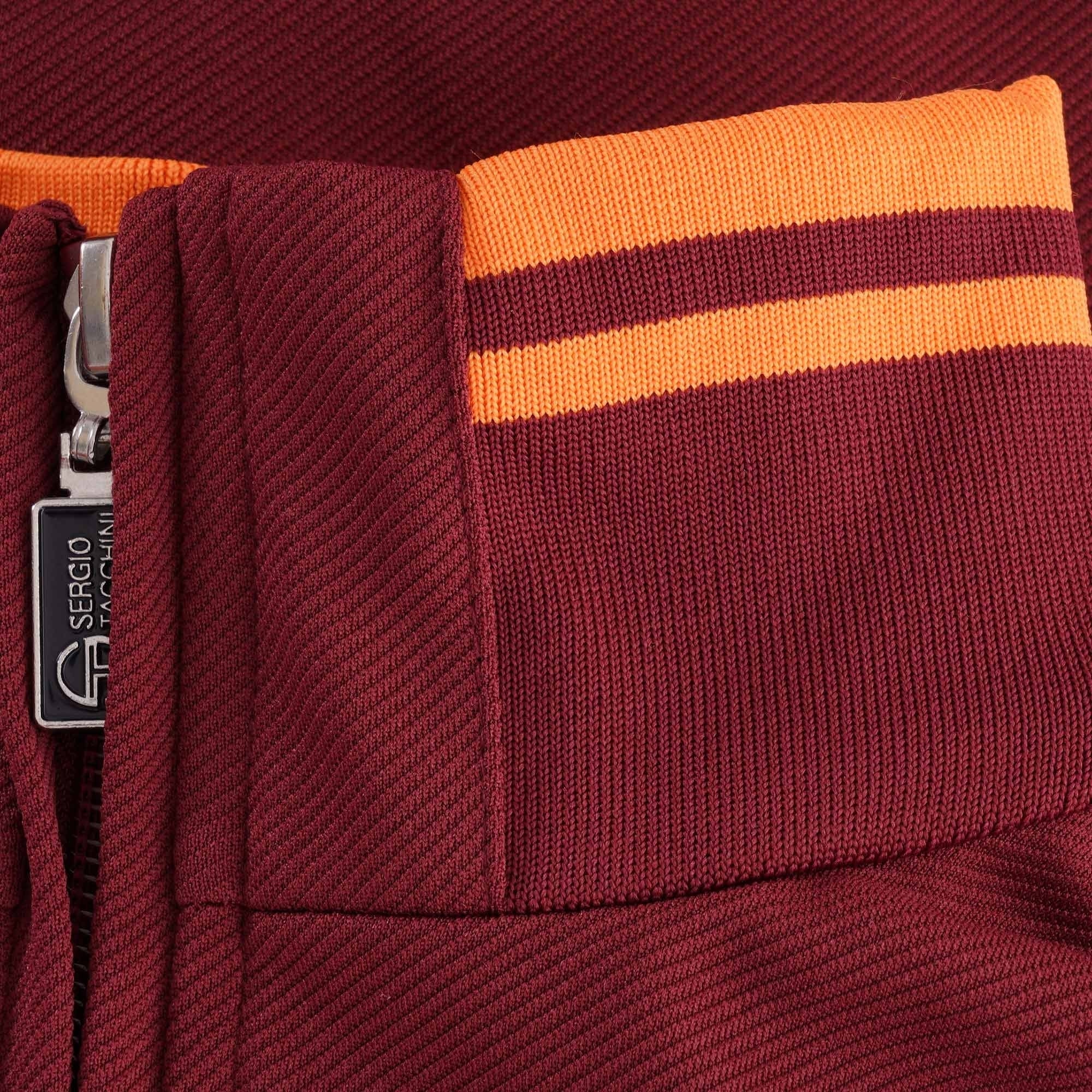 A close-up of the collar of the Sergio Tacchini Orion Track Top, showing the orange stripes.