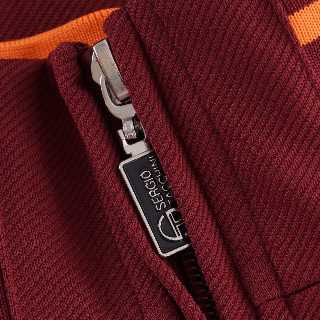 A close-up of the zip pull on the Sergio Tacchini Orion Track Top, featuring brand name.