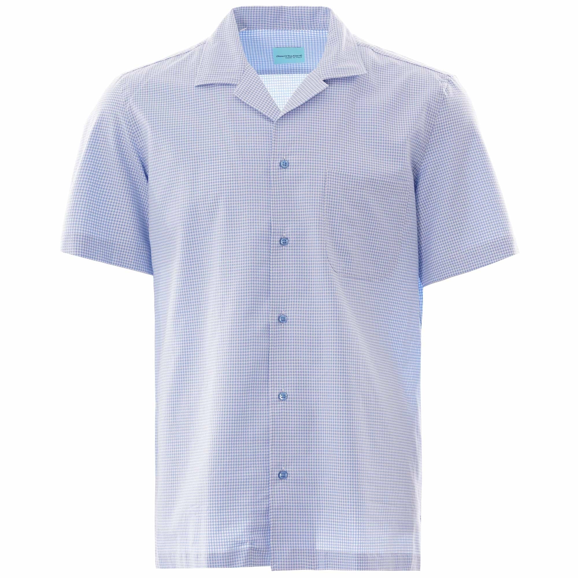 Front view of a men's light blue houndstooth short-sleeved shirt with a revere collar.