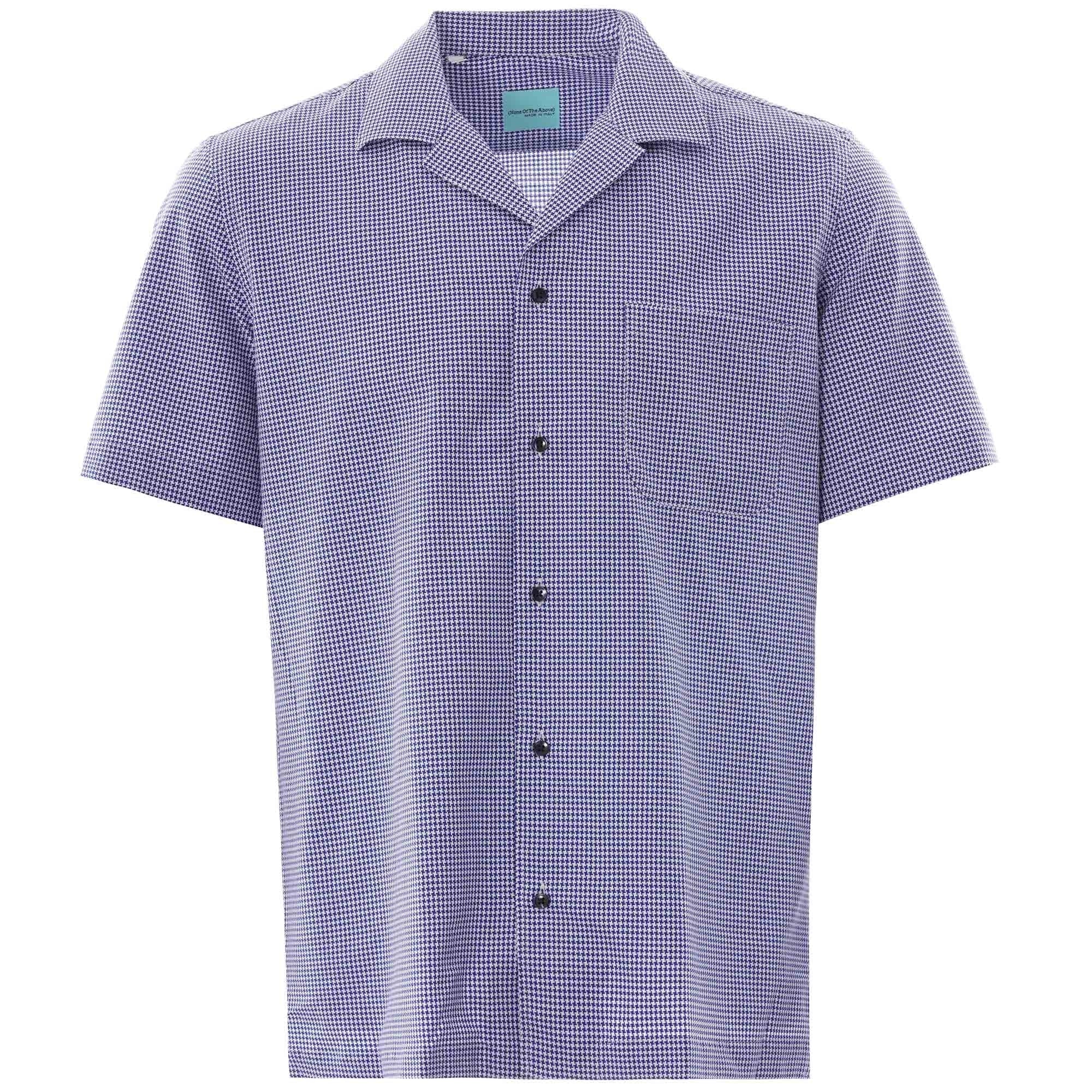 A blue houndstooth patterned short-sleeved shirt with a revere collar and single chest pocket.