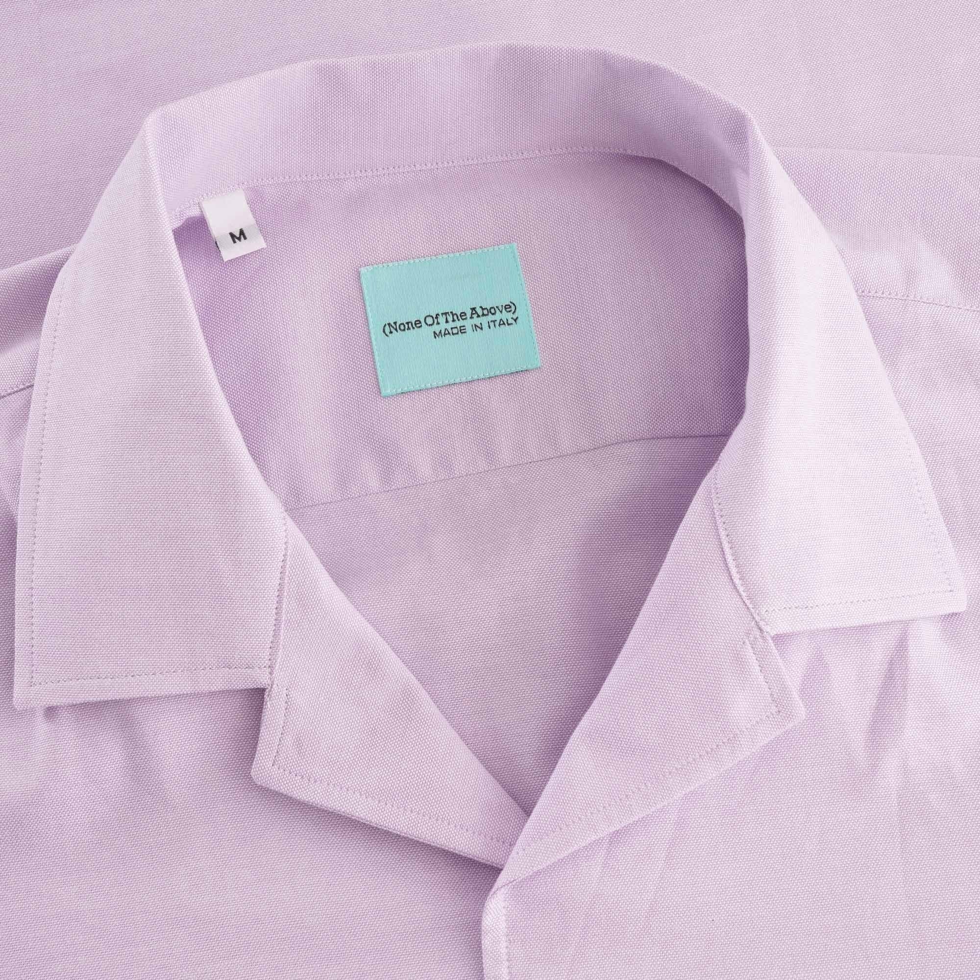 A close-up shot of the shirt's collar and brand label.