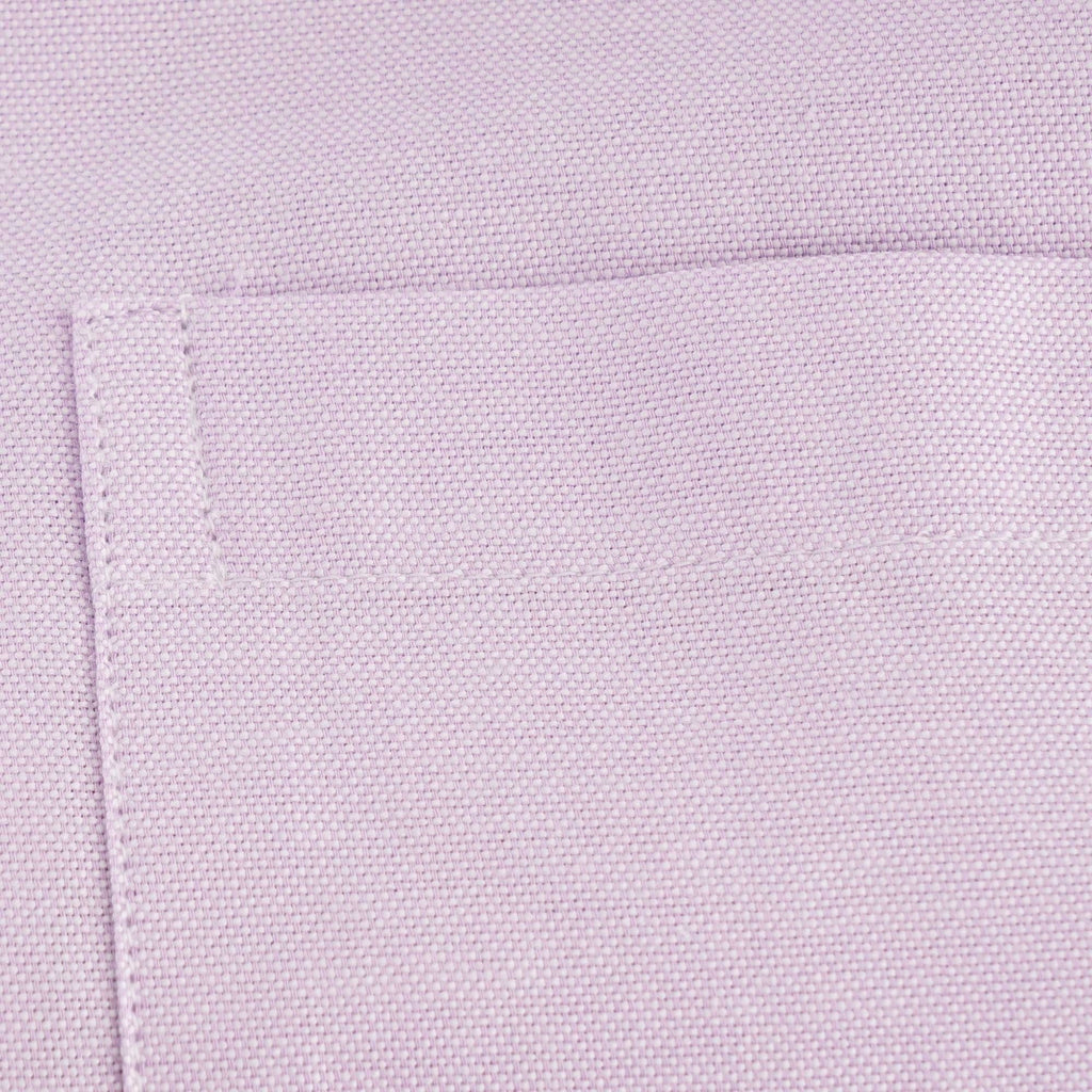 A close-up shot of the texture of the shirt's pocket.