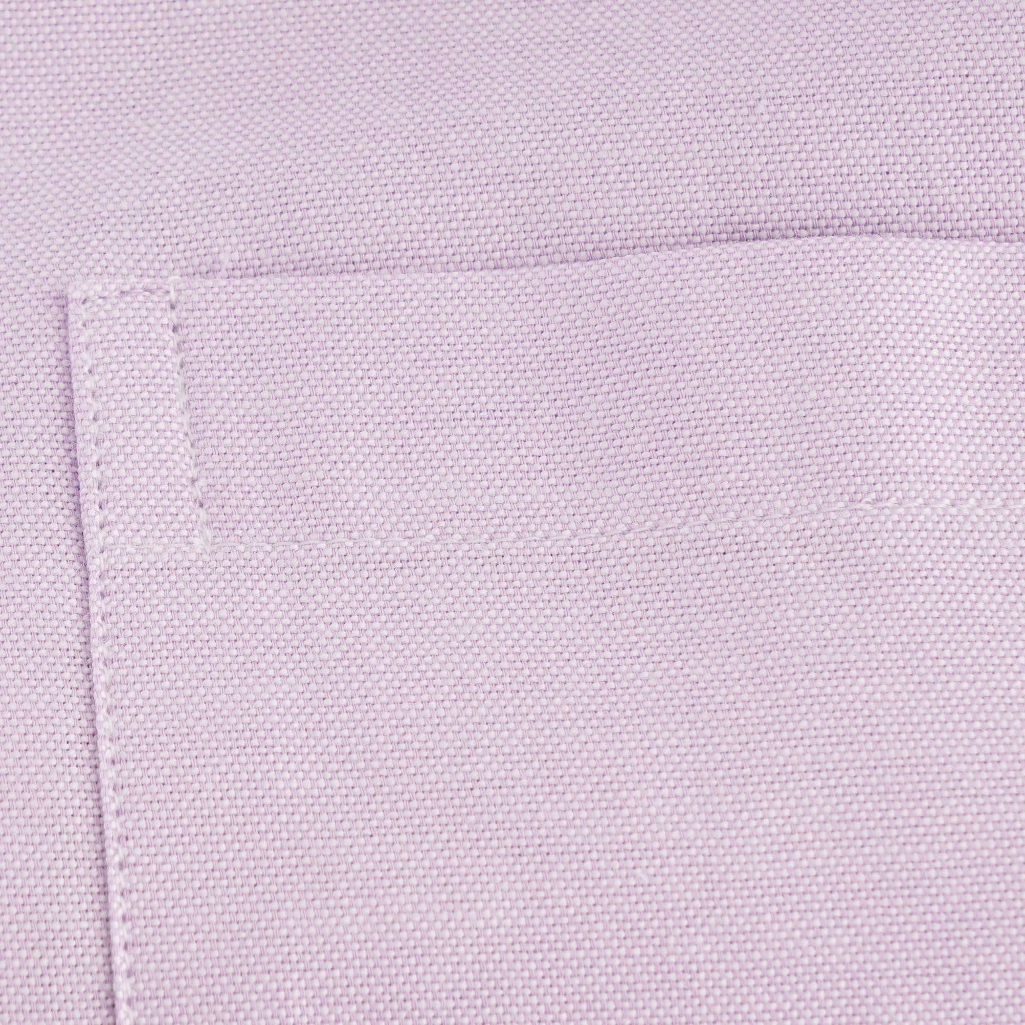 A close-up shot of the texture of the shirt's pocket.