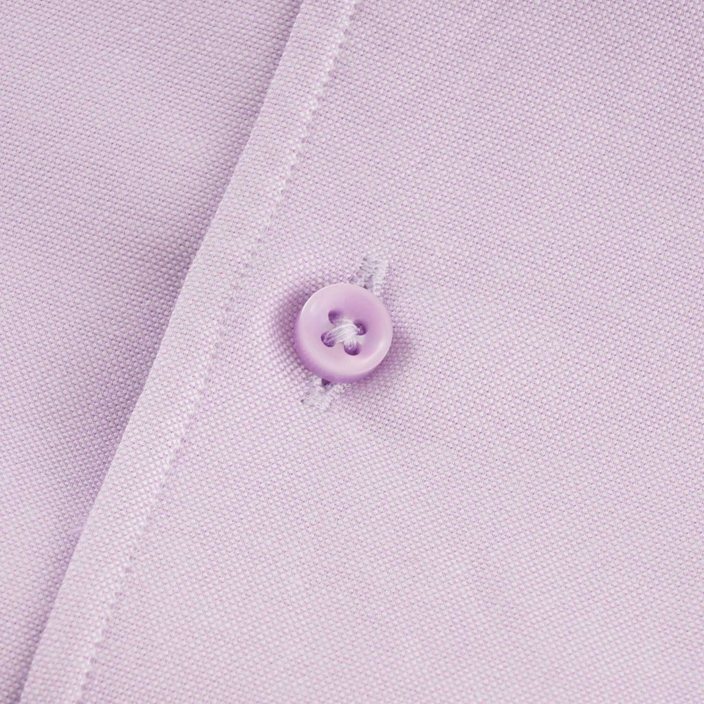 A close-up shot of one of the shirt's buttons.
