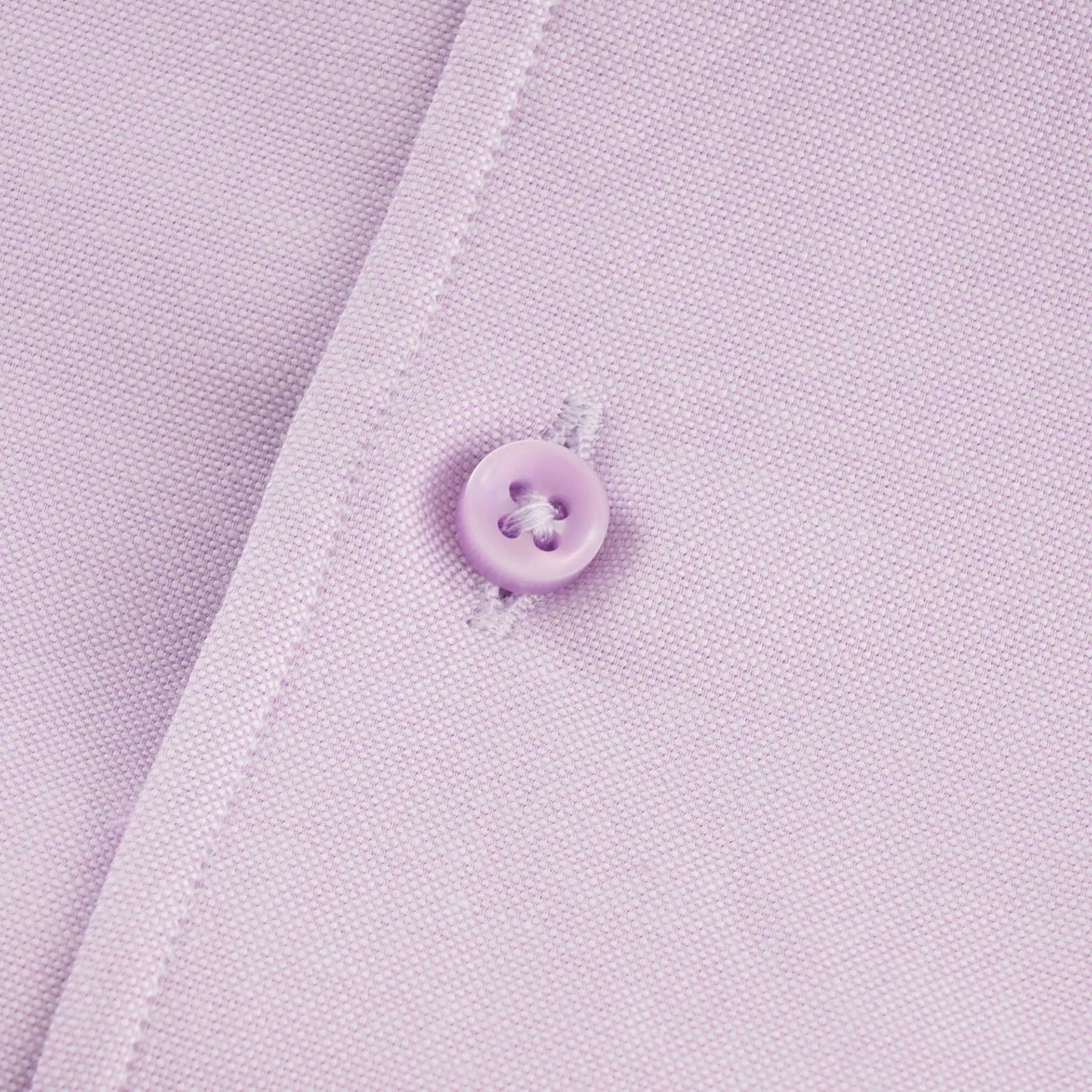A close-up shot of one of the shirt's buttons.