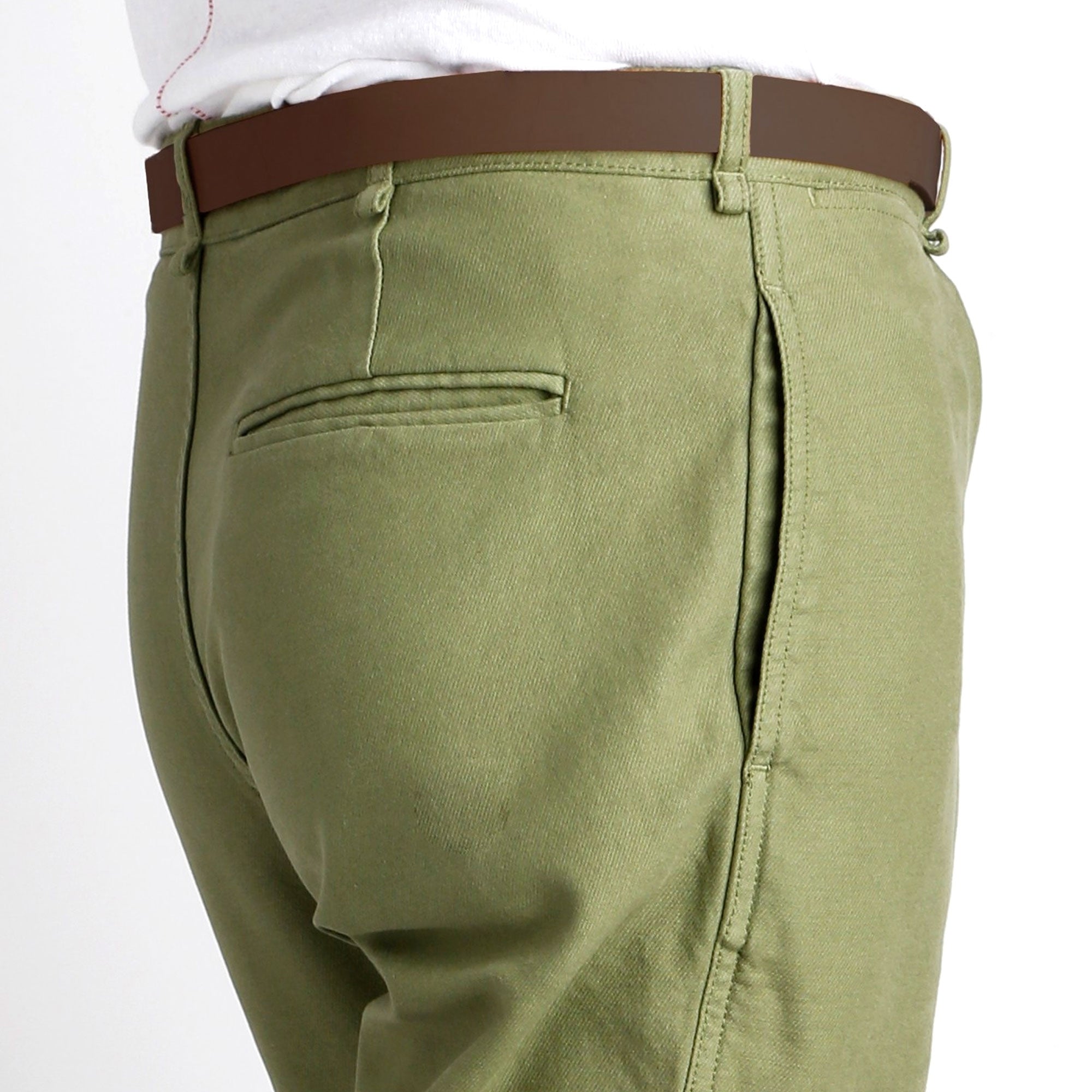 Rear view of sage green trousers, highlighting the back pocket and side seam.