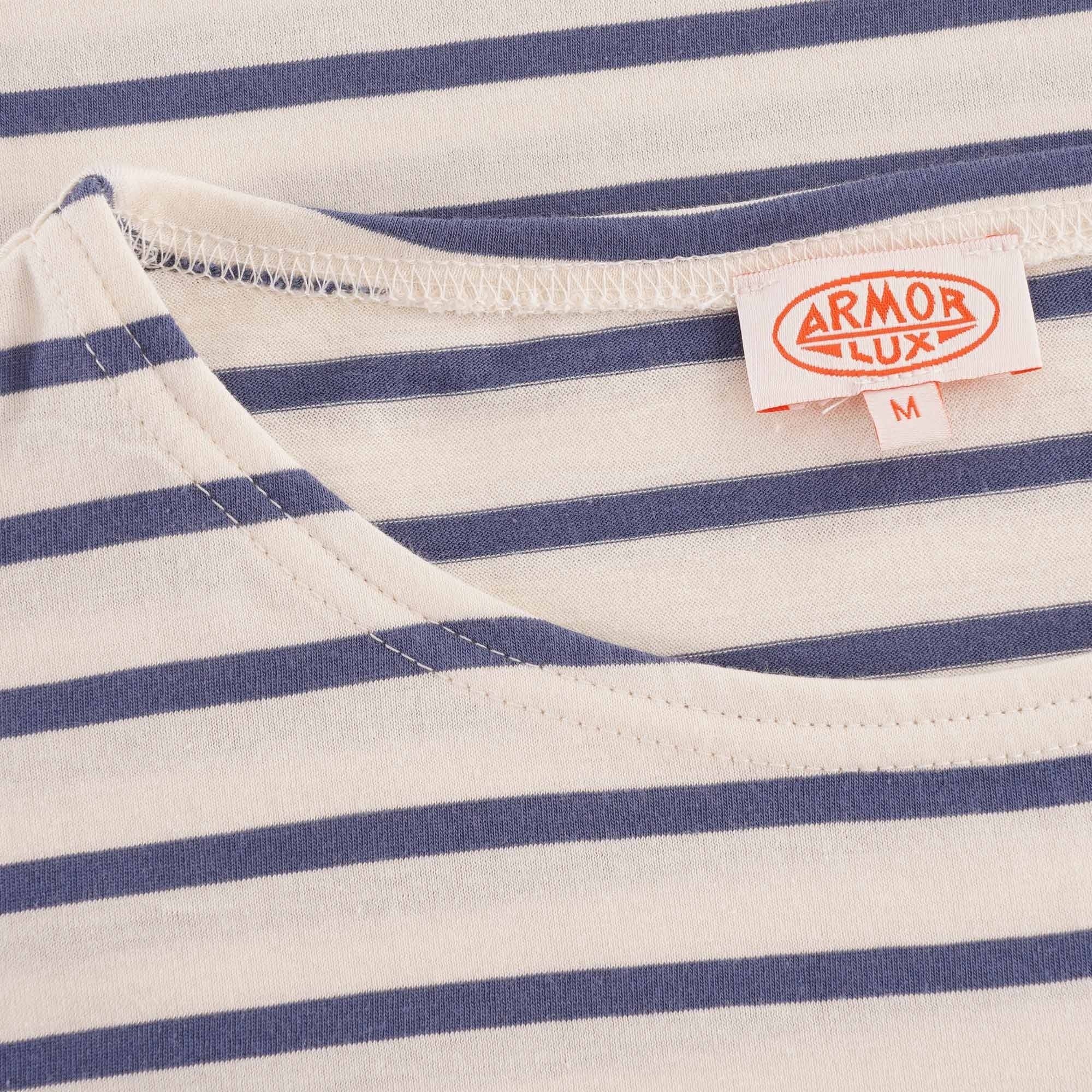 A close up of the t-shirt's neckline and brand tag.