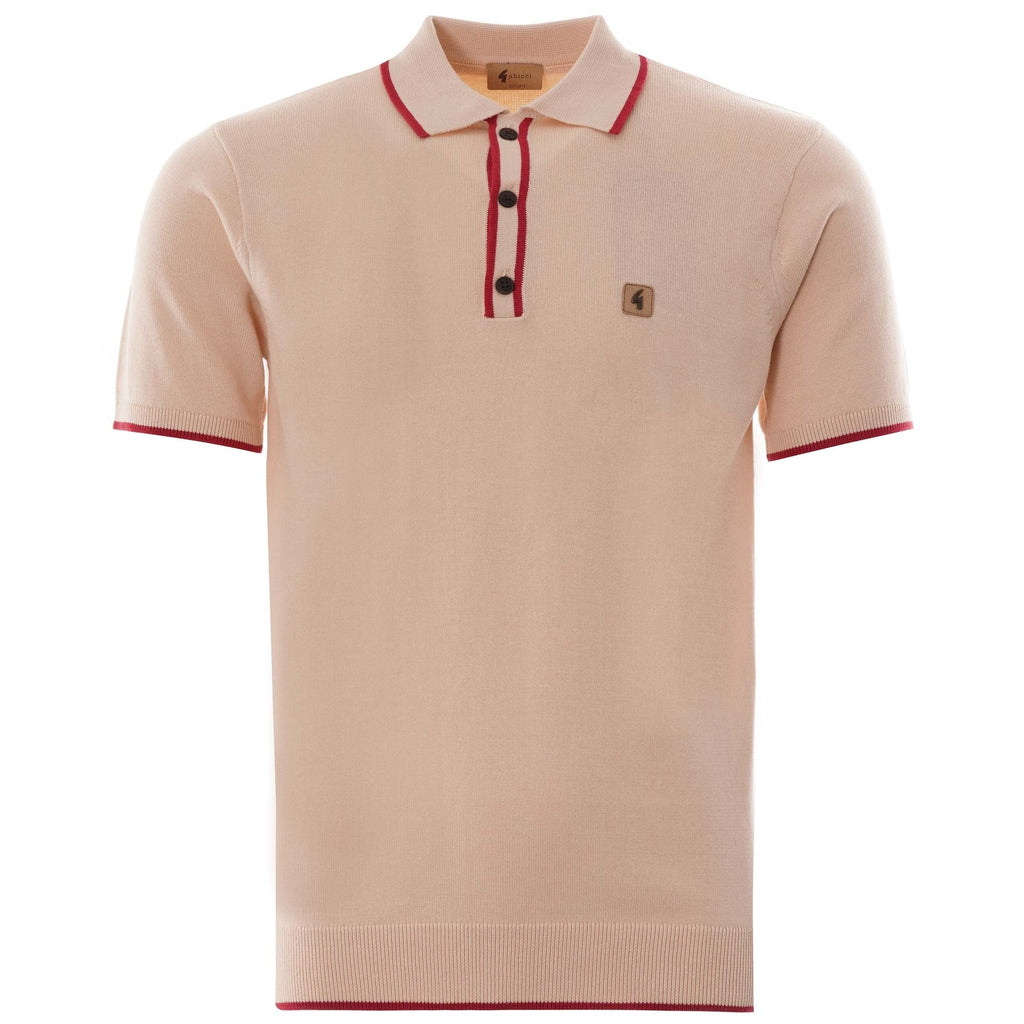 A close up of a beige polo shirt with a red trim.