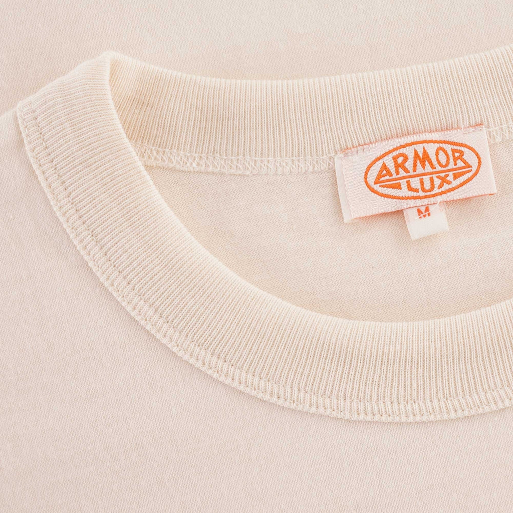 A close-up of the T-shirt's neckline and the branded 'Armor Lux' label.