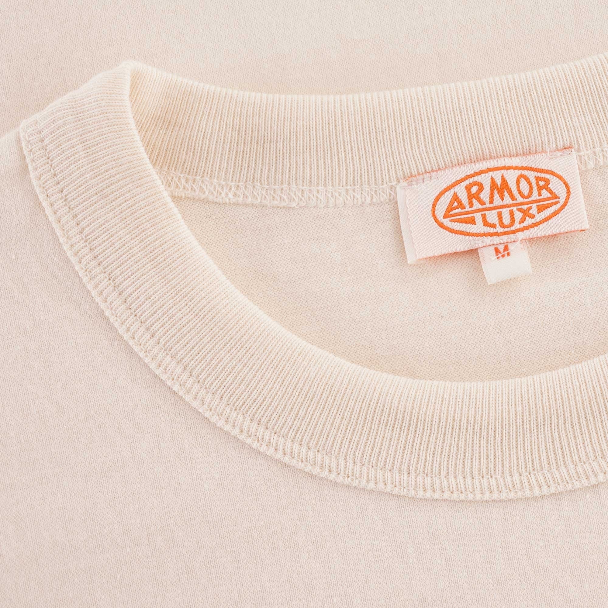 A close-up of the T-shirt's neckline and the branded 'Armor Lux' label.