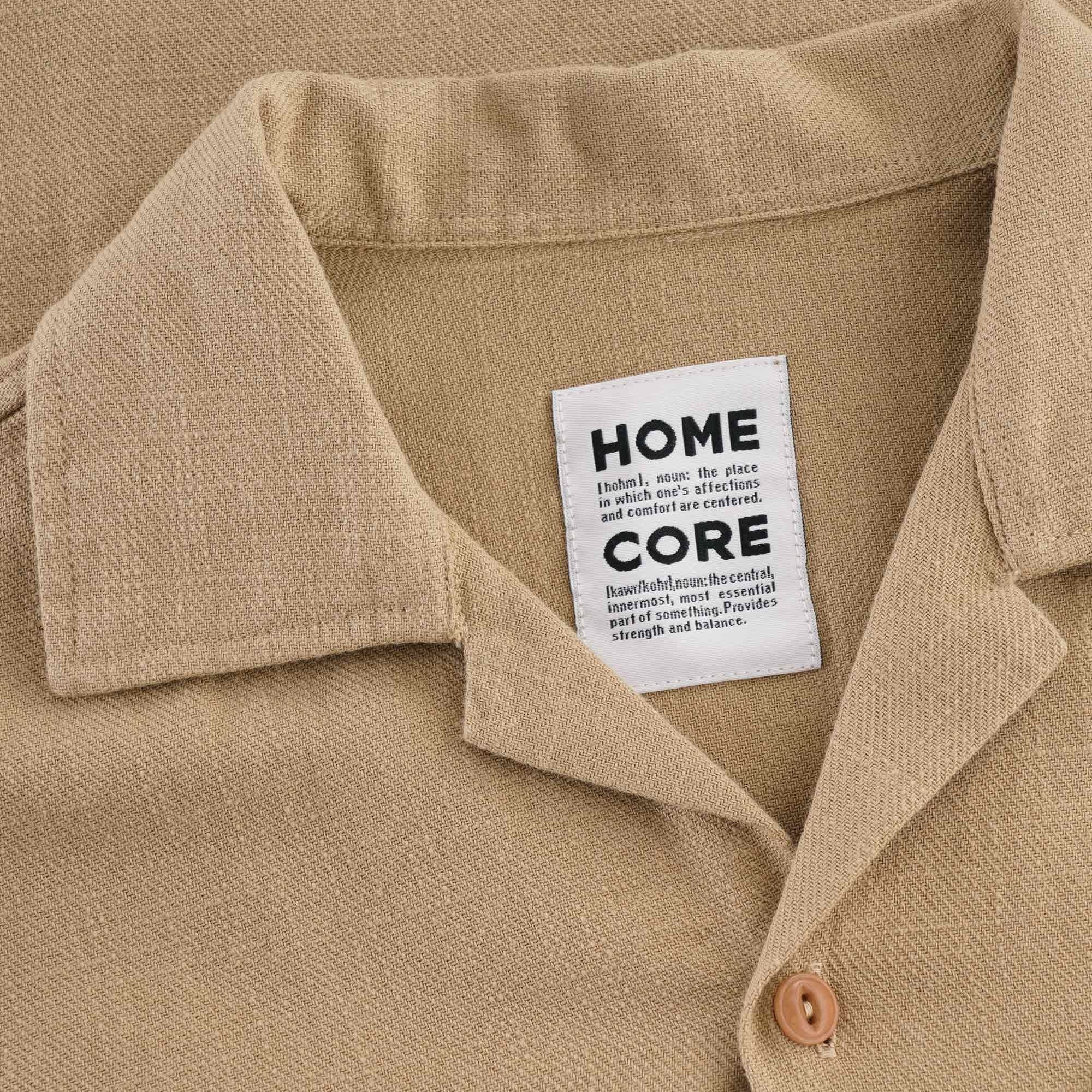 Close-up of the shirt's collar and brand label, 'HOME CORE'.