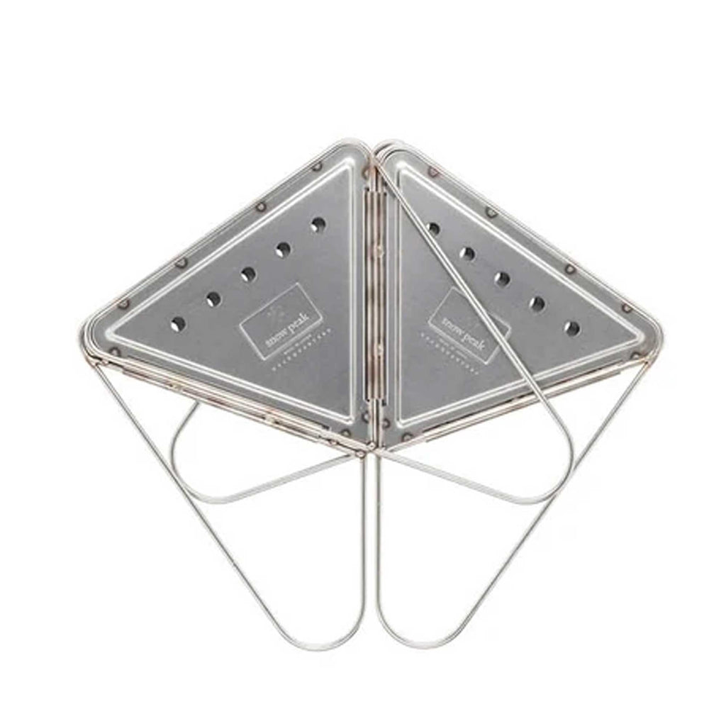A four-sided stainless steel fire pit folded flat, against a white background.