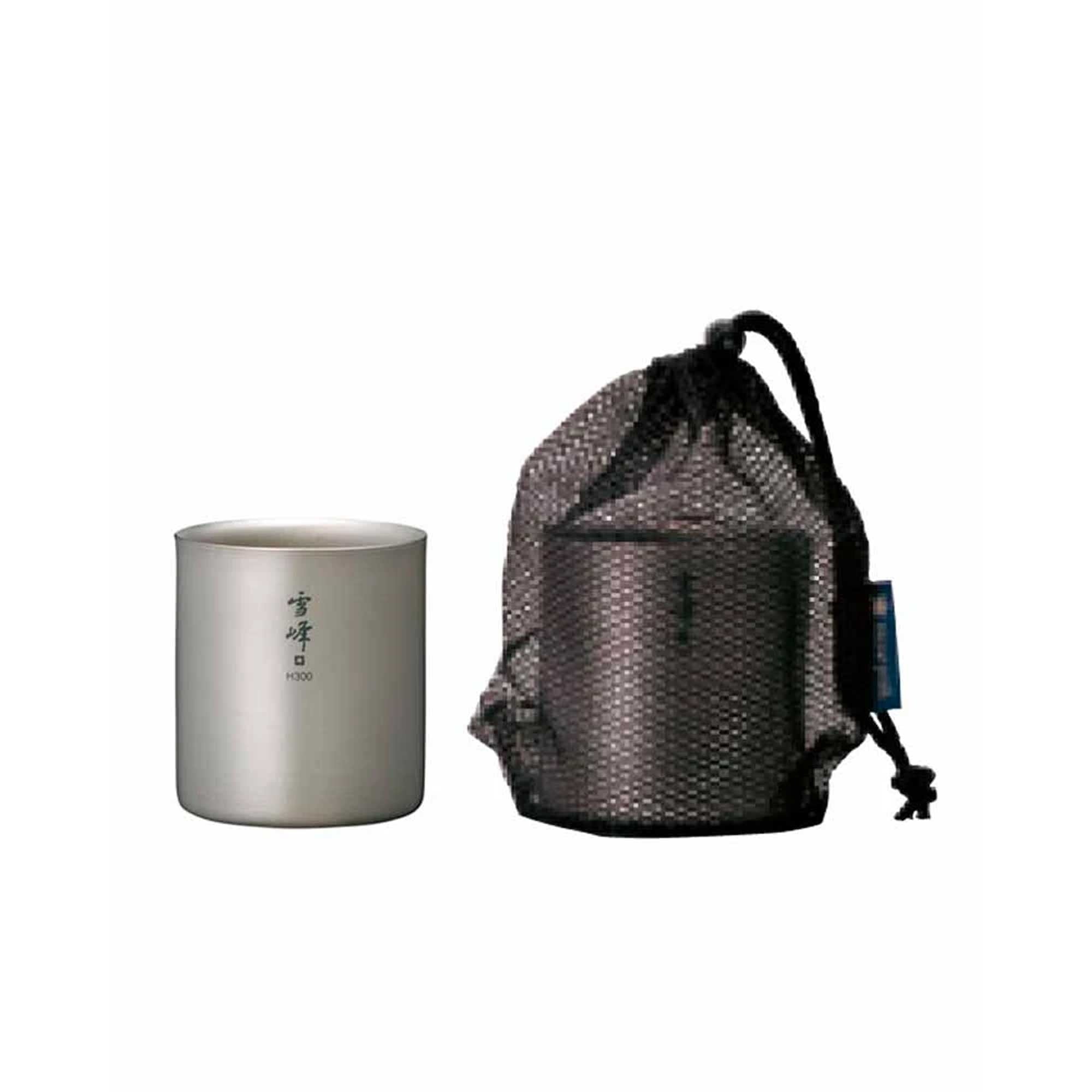 A shiny metal mug and a dark mesh bag containing an identical mug.