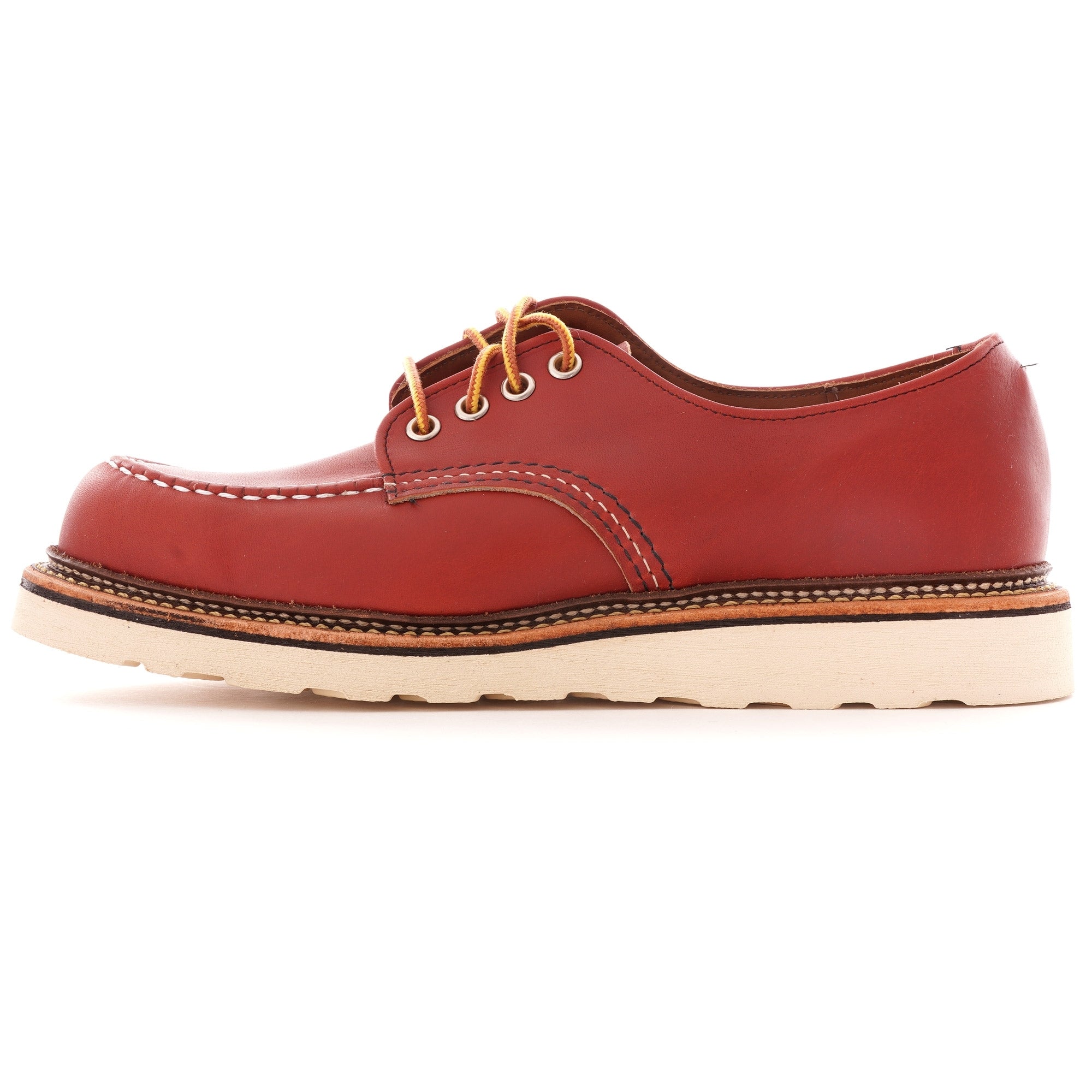 Side profile of a single Red Wing Postman Oxford, in Oro Russet, with yellow laces.