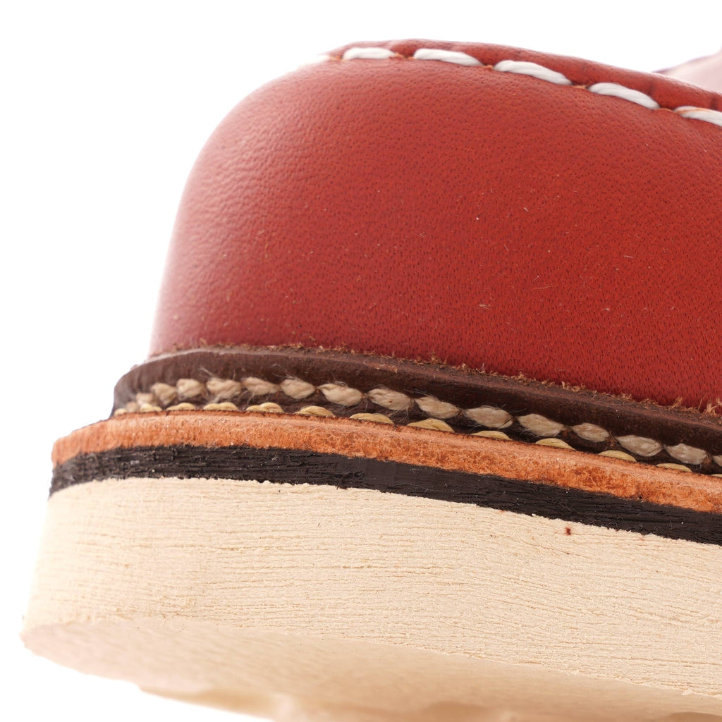 Close-up of the sole and stitching detail on a Red Wing Postman Oxford shoe.