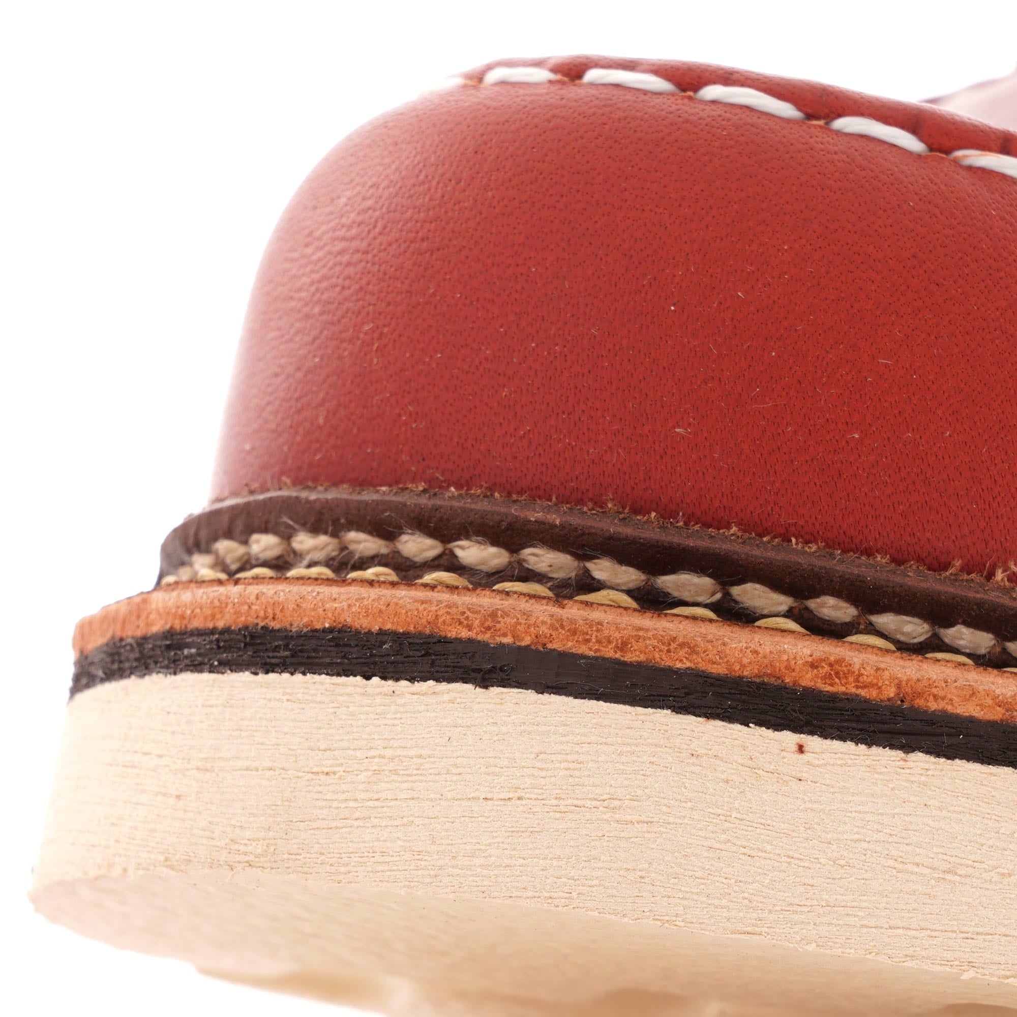 Close-up of the sole and stitching detail on a Red Wing Postman Oxford shoe.