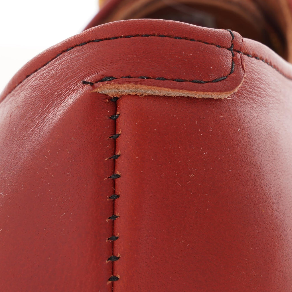 Close-up of the heel of a Red Wing Postman Oxford shoe in Oro Russet, showing stitching.