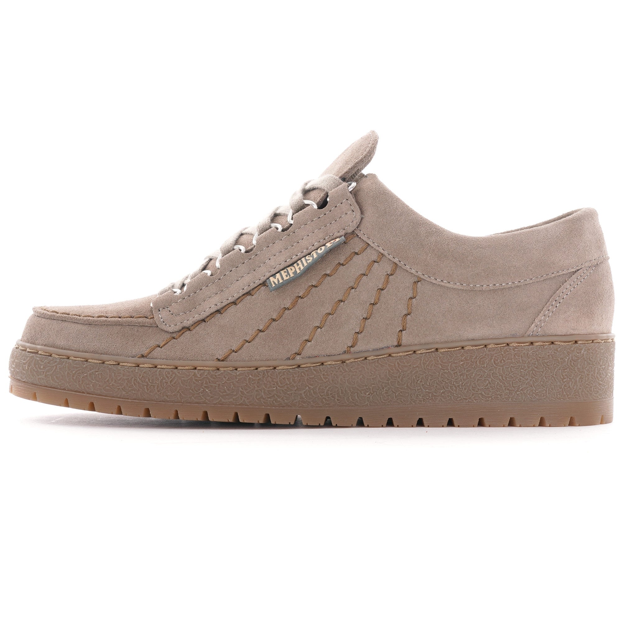 A single beige suede shoe with a thick sole and light coloured laces, viewed from the side.