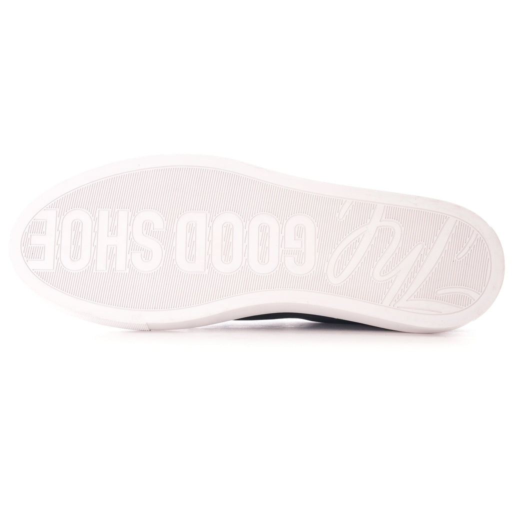 The sole of a dark blue shoe with white embossed text, 'GOOD SHOE'.
