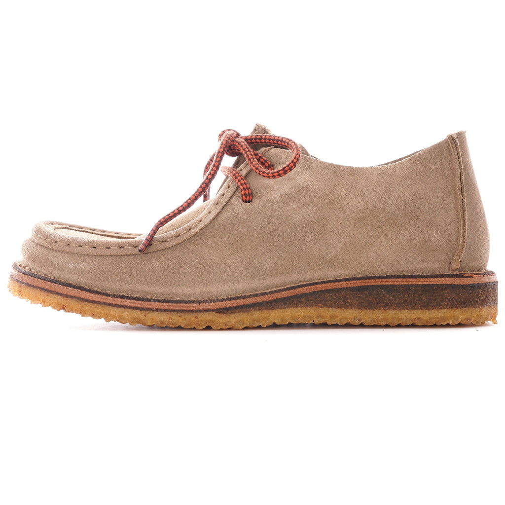 A single taupe suede shoe with red and black laces, viewed from the side.