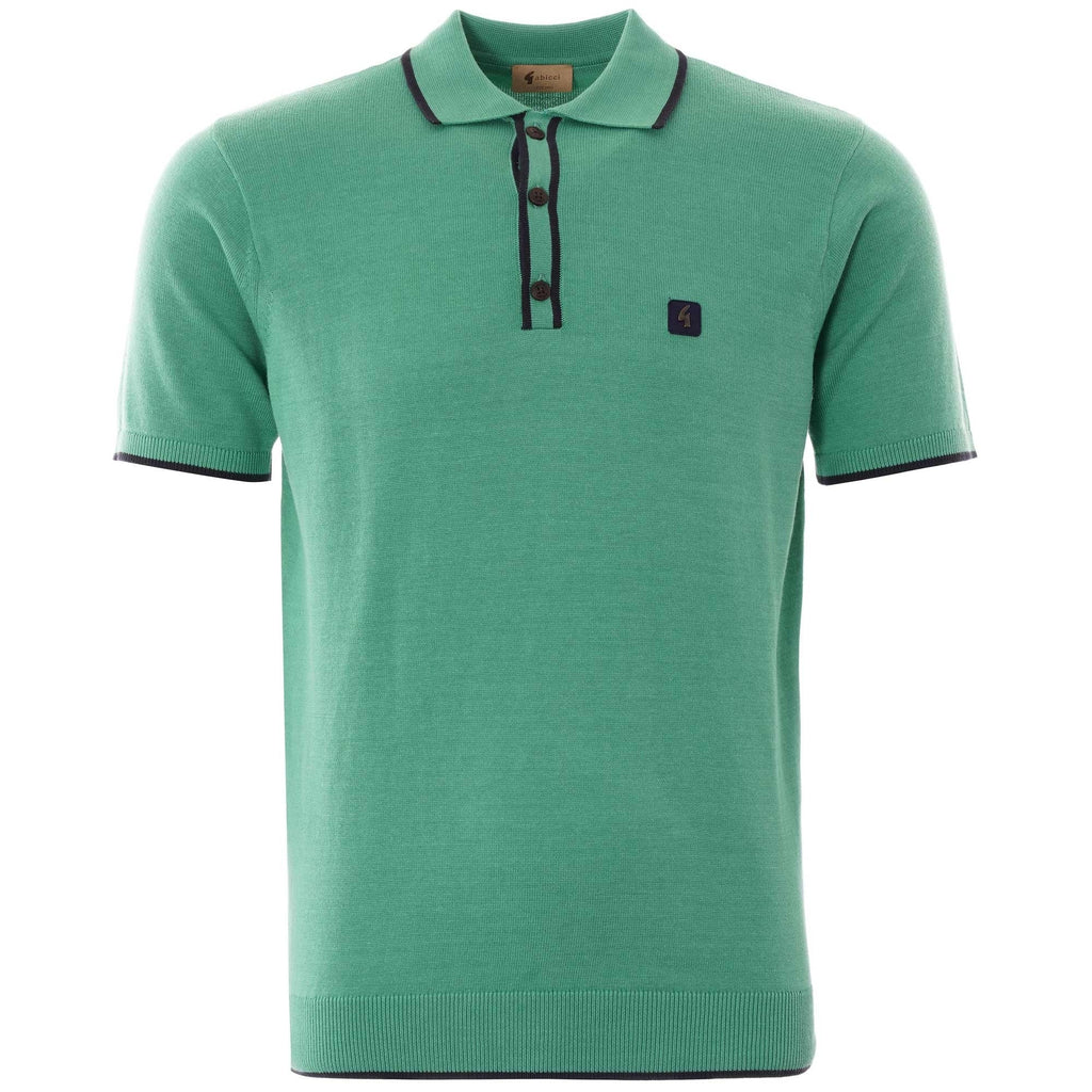 A green knitted polo shirt with dark trim on the collar, placket, and cuffs.
