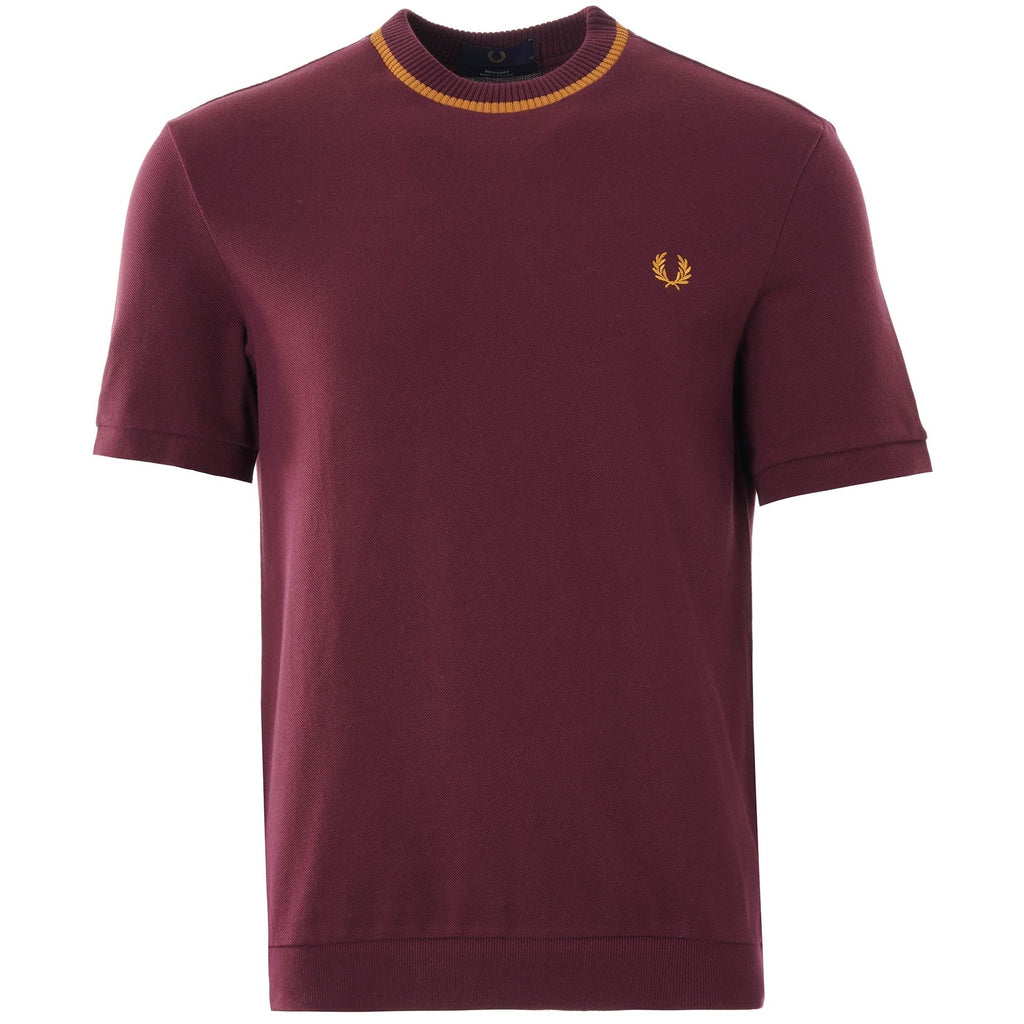 Front view of the Fred Perry Reissues crew neck t-shirt in mahogany with gold trim.