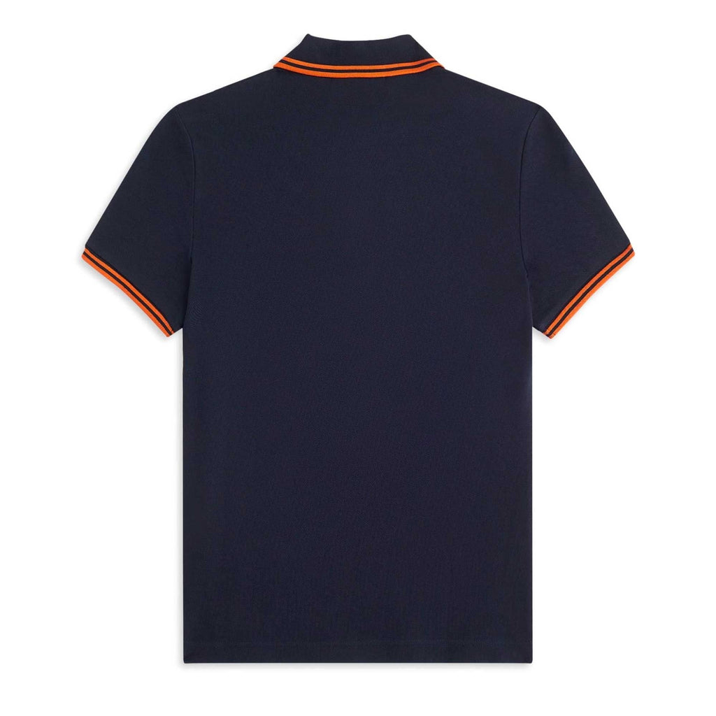 The rear view of a navy polo shirt, with orange tipping on the collar and sleeve cuffs.