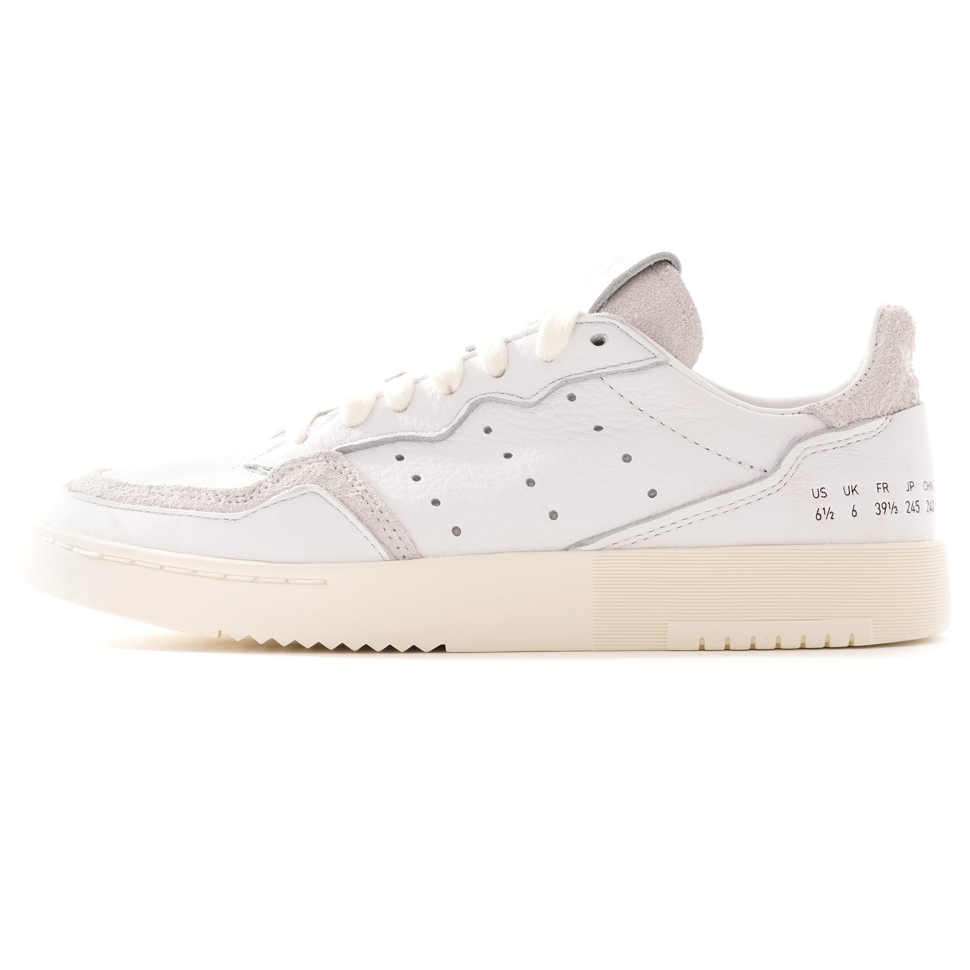 A white adidas Supercourt sneaker with a textured cream sole and light grey accents.