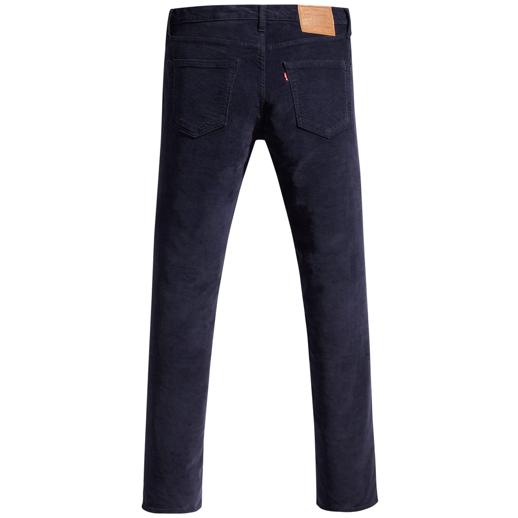 A full-length rear view of navy corduroy trousers on a white background.