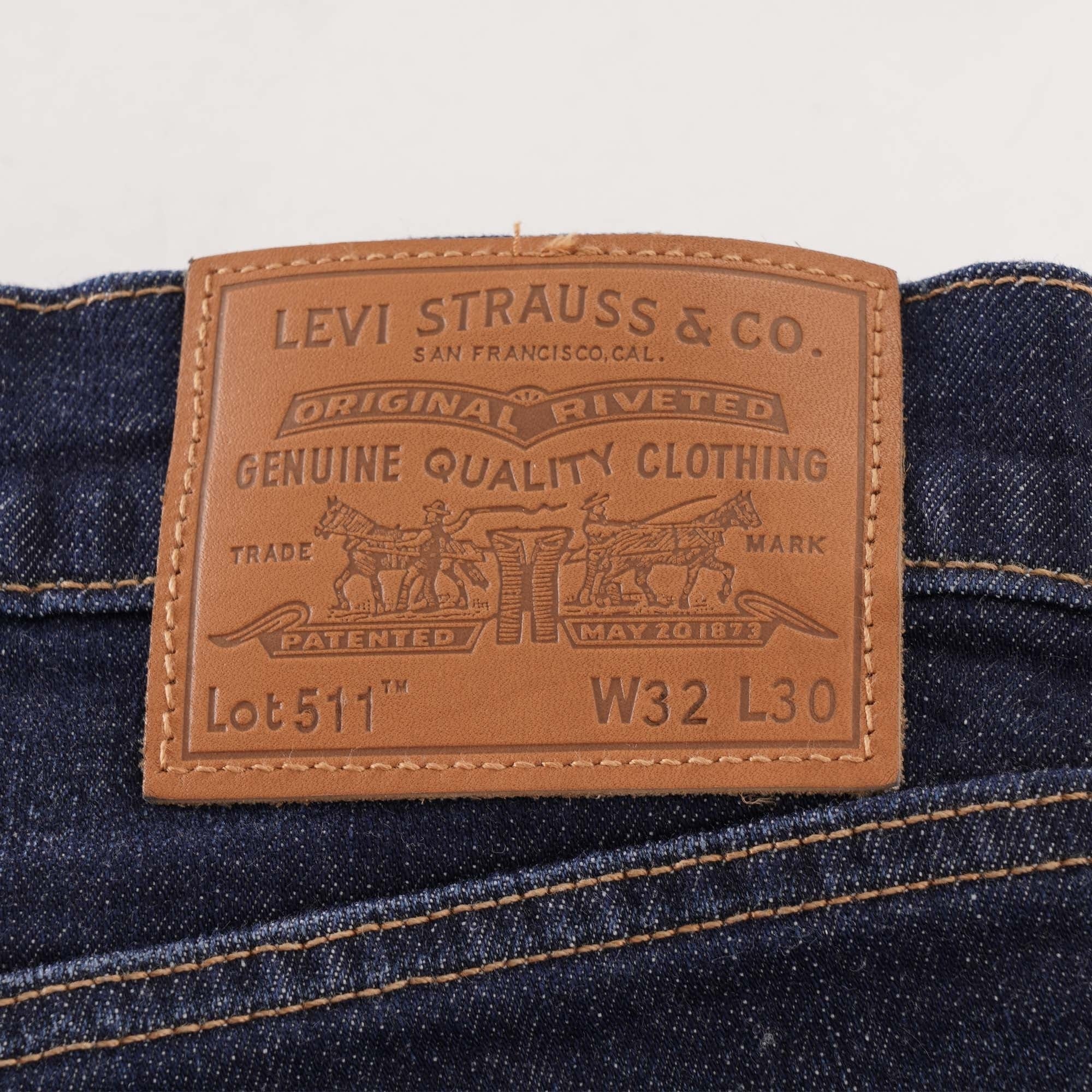 A detailed view of the brown leather Levi Strauss & Co. patch on the jeans.