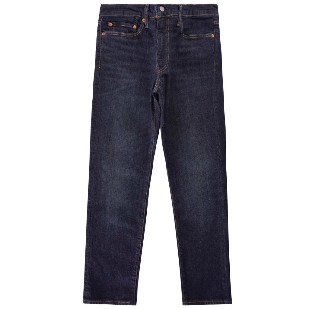 A pair of dark wash Levi's 511 slim fit jeans, displayed flat on a white background.